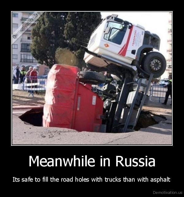 demotivation.us_Meanwhile-in-Russia-Its-safe-to-fill-the-road-holes-with-trucks-than-with-asphalt_130705193770